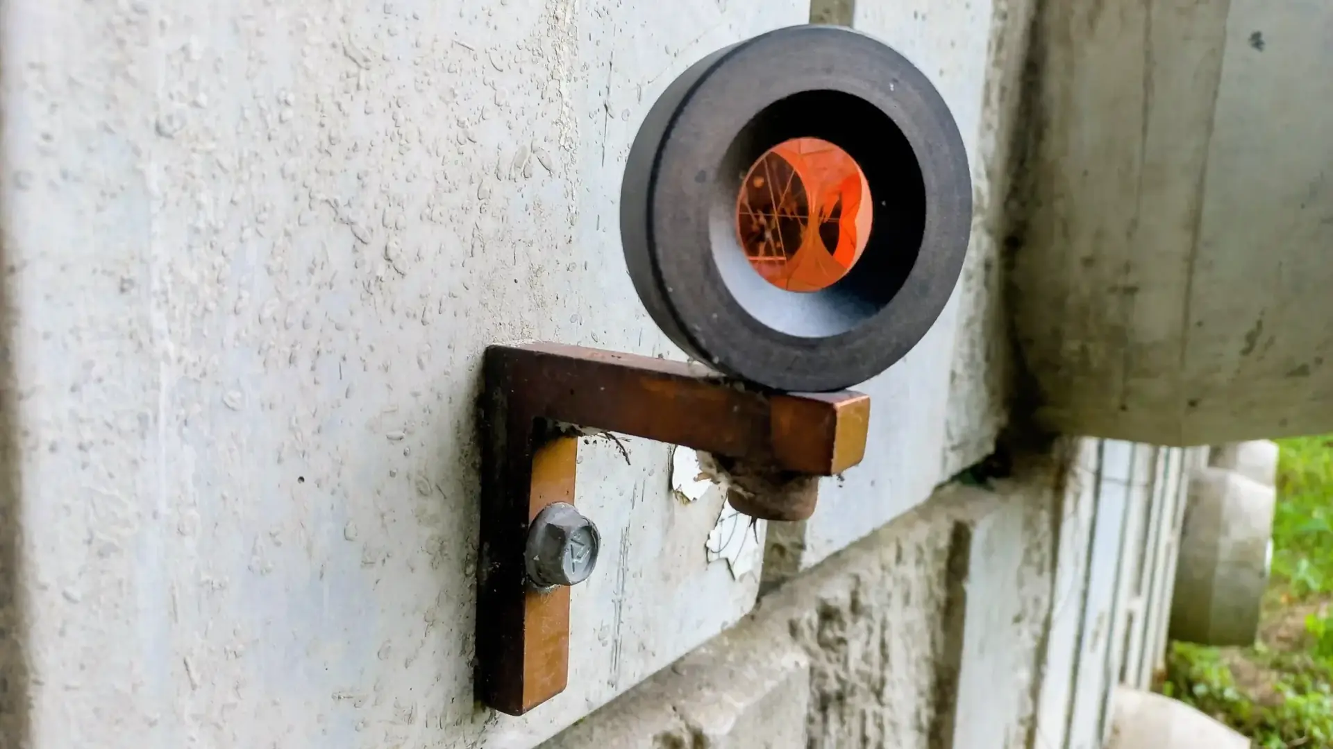 Survey monitoring prism mounted on bridge abutment for movement detection Sydney